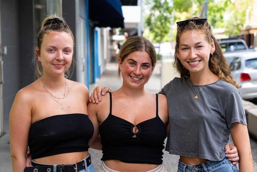 Three women outside