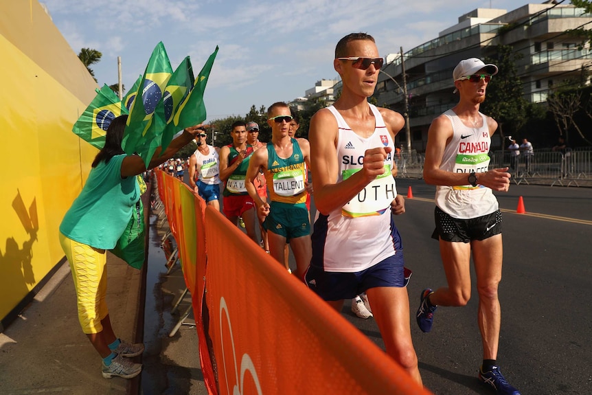 Australia's Jared Tallent (L), Slovakia's Matej Toth and Canada's Evan Dunfee in men's 50km walk.