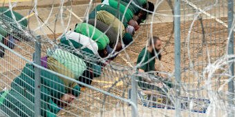 Inmates praying at Goulburn Supermax