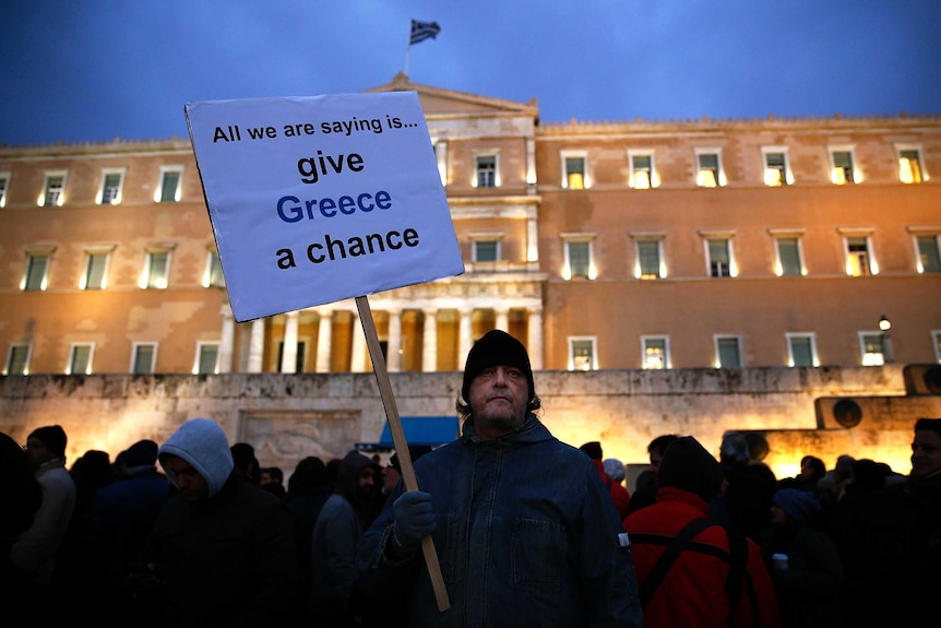 Greeks rally in support of new anti-austerity government in February.