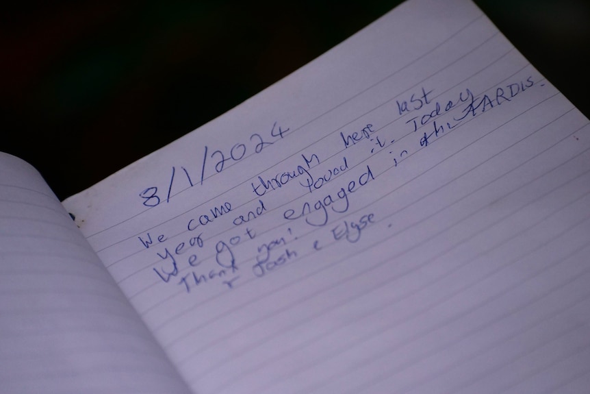 A message in a notebook from a couple who got engaged at the TARDIS