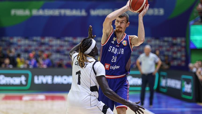 Borisa Simanic holds the basketball