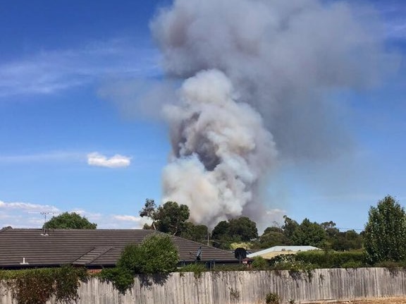 A fire burns at Crib Point