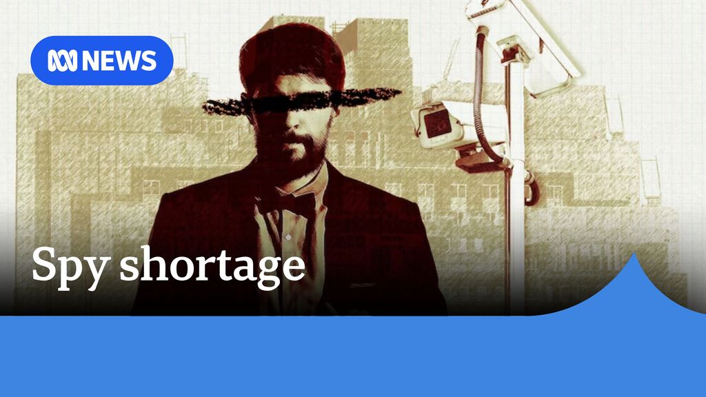 Spy Shortage: Sepia toned image with cctv camera and man in suit with face etched out.