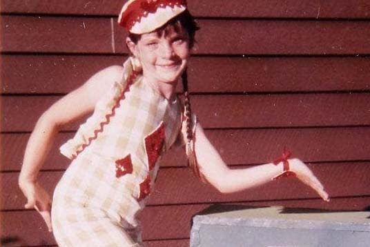 Allison Baden-Clay as a child, posing in a dance costume.