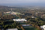 View from a hot air balloon above the Museum of Australian Democracy and Parliament House.