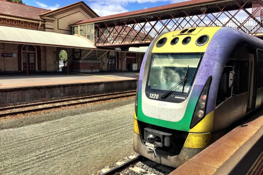 A train arrives at a station.