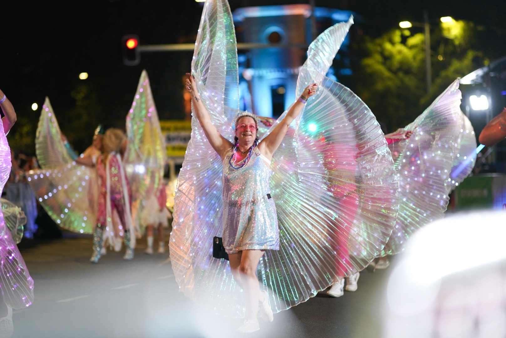 A woman with big glittery wings