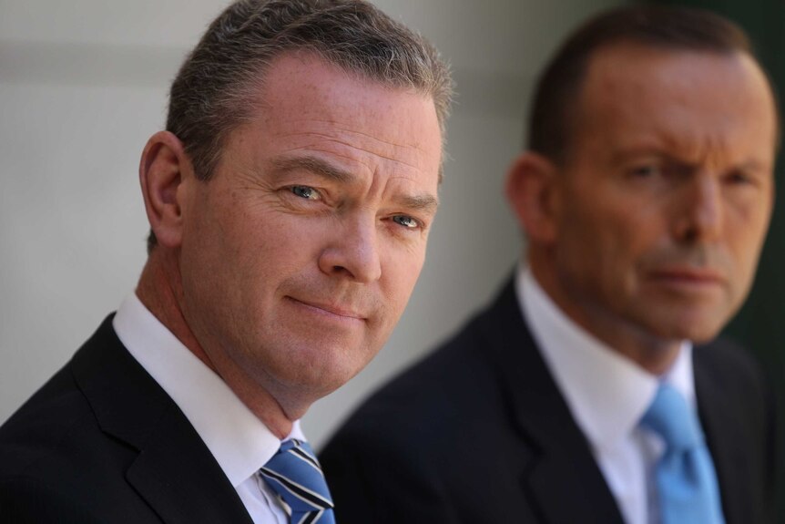 Tony Abbott and Education Minister Christopher Pyne speak at a press conference at Parliament House Canberra.