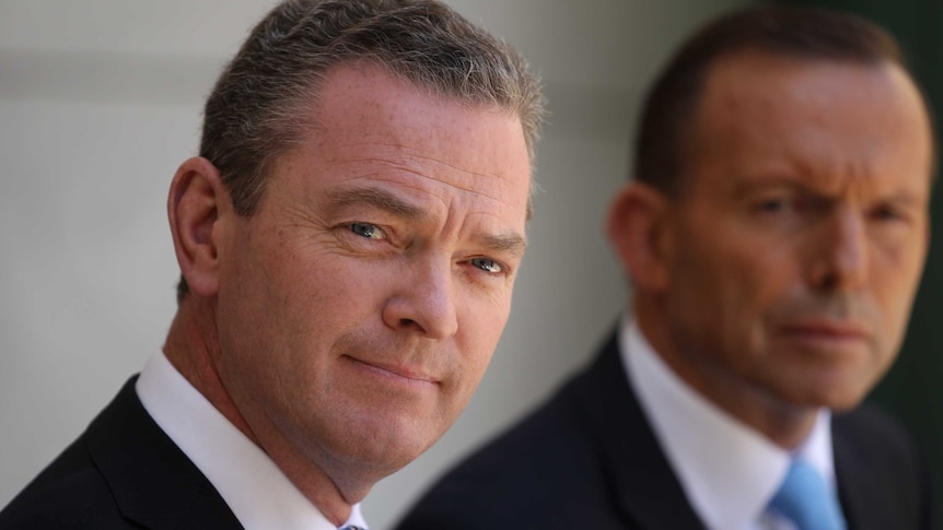 Tony Abbott and Education Minister Christopher Pyne speak at a press conference at Parliament House Canberra.