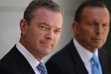 Tony Abbott and Education Minister Christopher Pyne speak at a press conference at Parliament House Canberra.