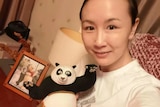 A selfie taken by Peng Shuai holding a Kung Fu Panda doll.