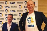 Tom Gleesonstands next to a cardboard cut-out of Grant Denyer.