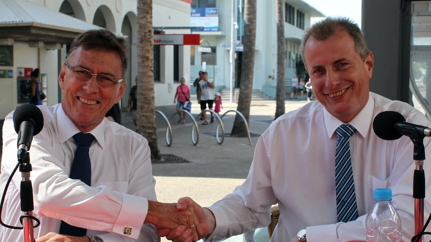 Terry Mills and Paul Henderson shake hands ahead of the election