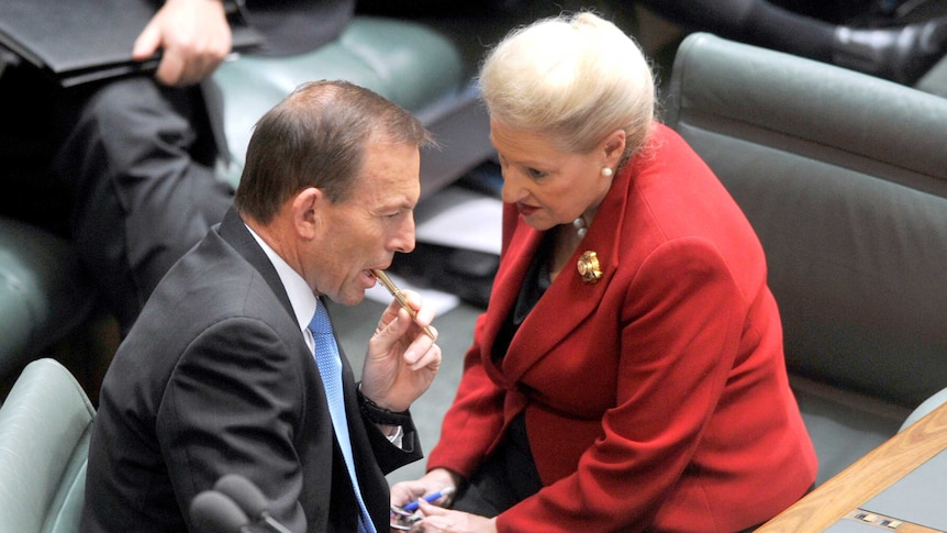 Tony Abbott listens to Bronwyn Bishop in Parliament