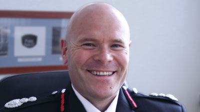 Dan Stephens wearing a Merseyside Fire and Rescue Service uniform.