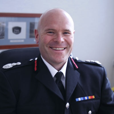 Dan Stephens wearing a Merseyside Fire and Rescue Service uniform.