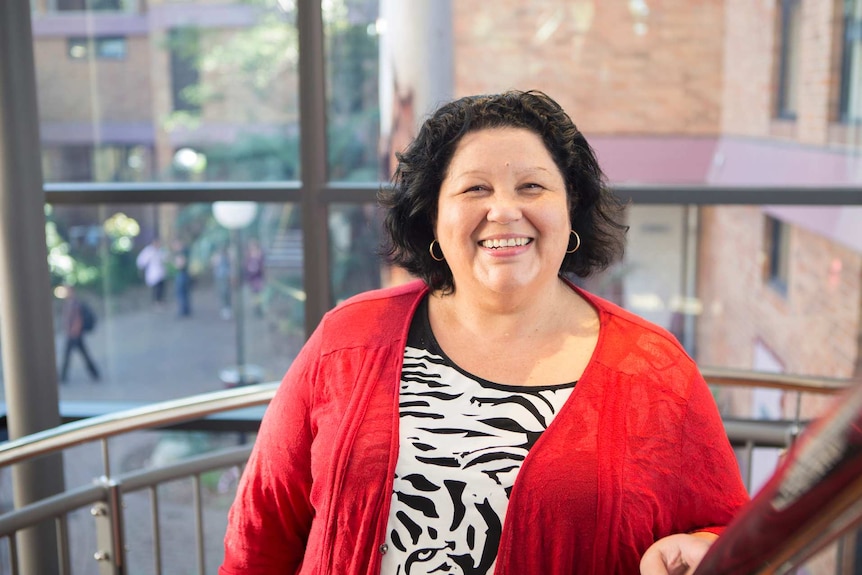 Professor Bronwyn Carlson smiling to camera.