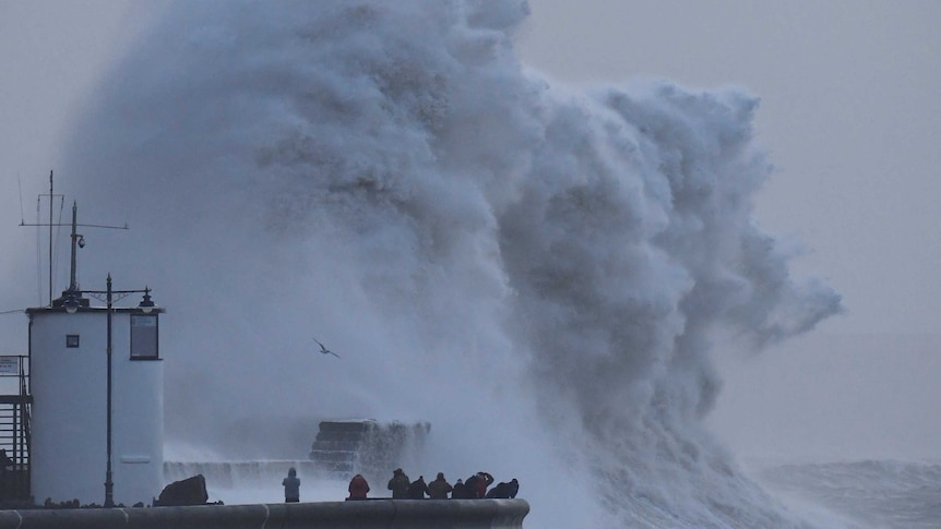 People view large waves and high winds associated with Storm Eleanor.