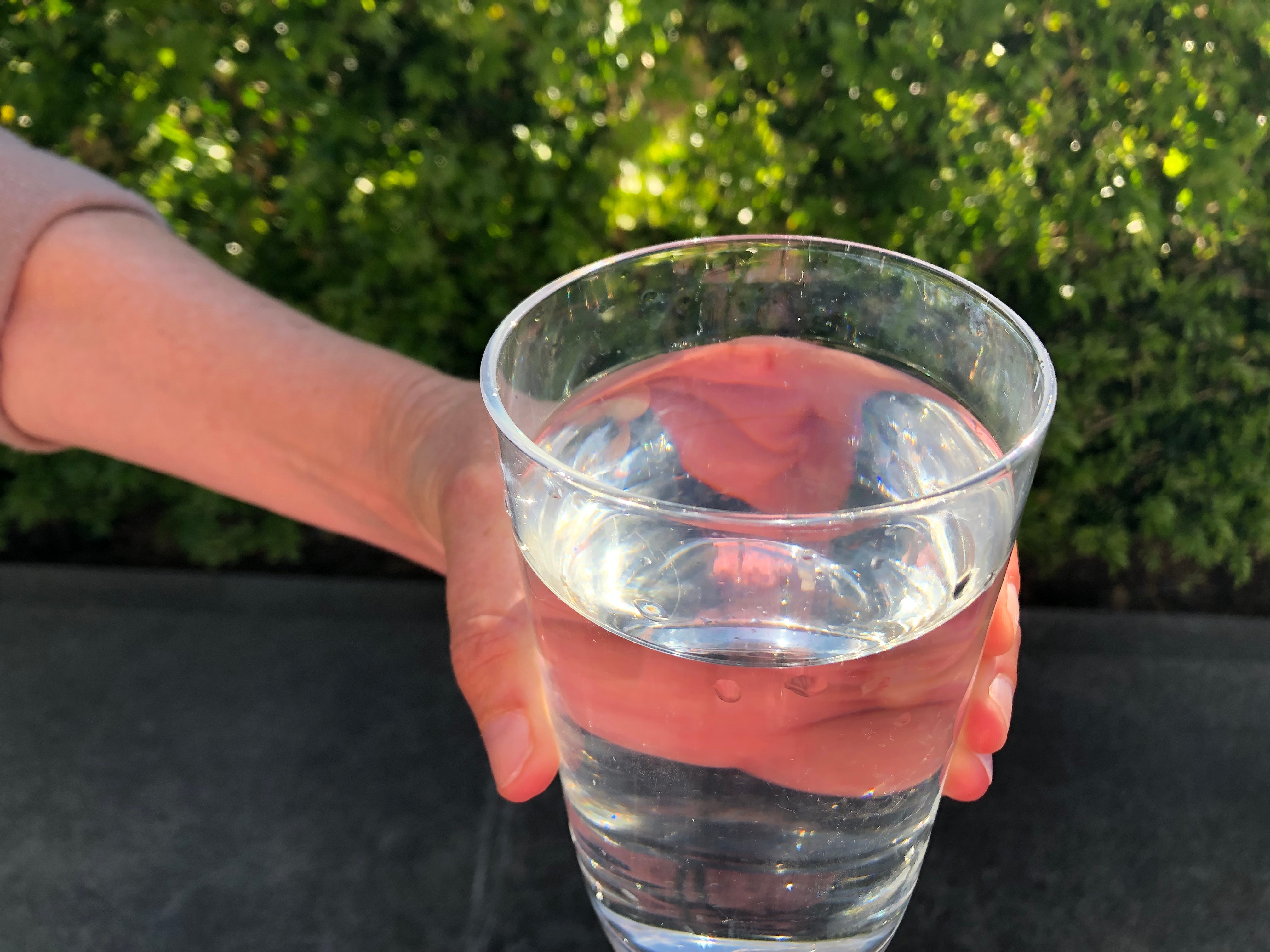 A glass of water.