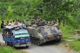 Timor-Leste Battle Group soldiers conduct a vehicle check point