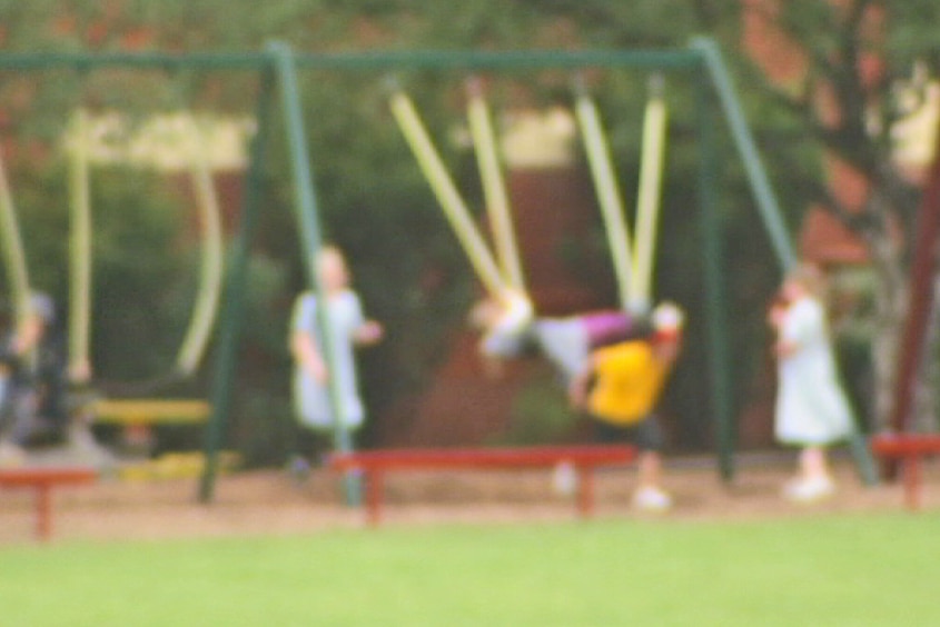 Children on playground generic blurred image