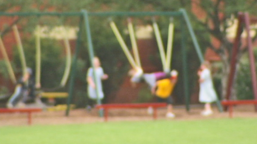 Children on playground generic blurred image