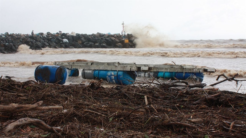 An oyster pontoon washed up on Town Beach in Port Macquarie.