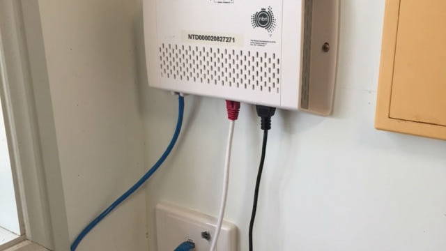 White power box with three cords coming out of it
