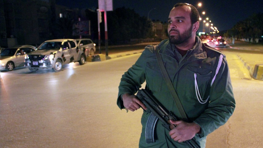 A Libyan policeman on patrol in Benghazi. Libya says it is surprised by the warnings.