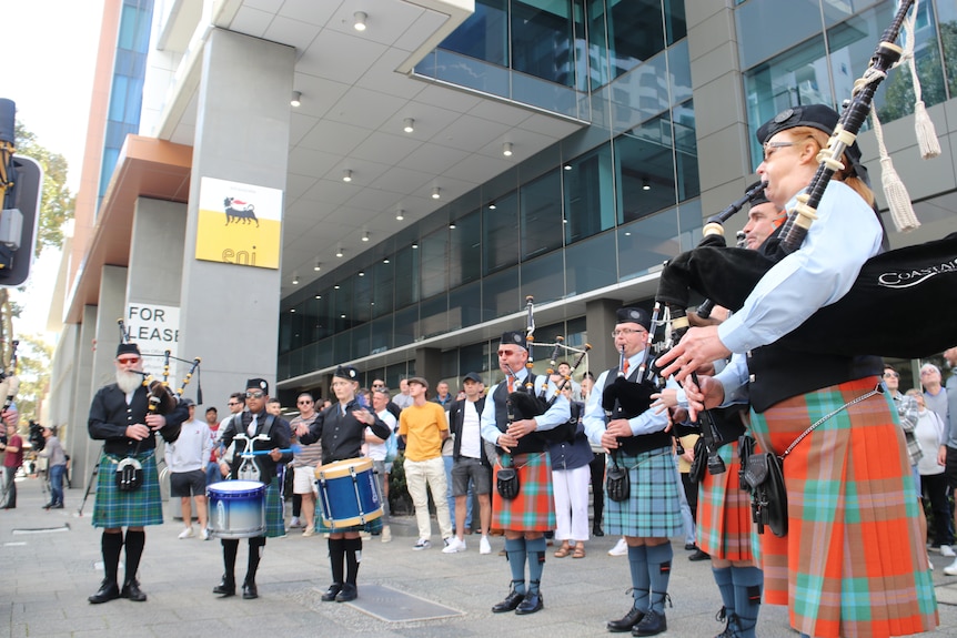 Pipe band plays in the streets.