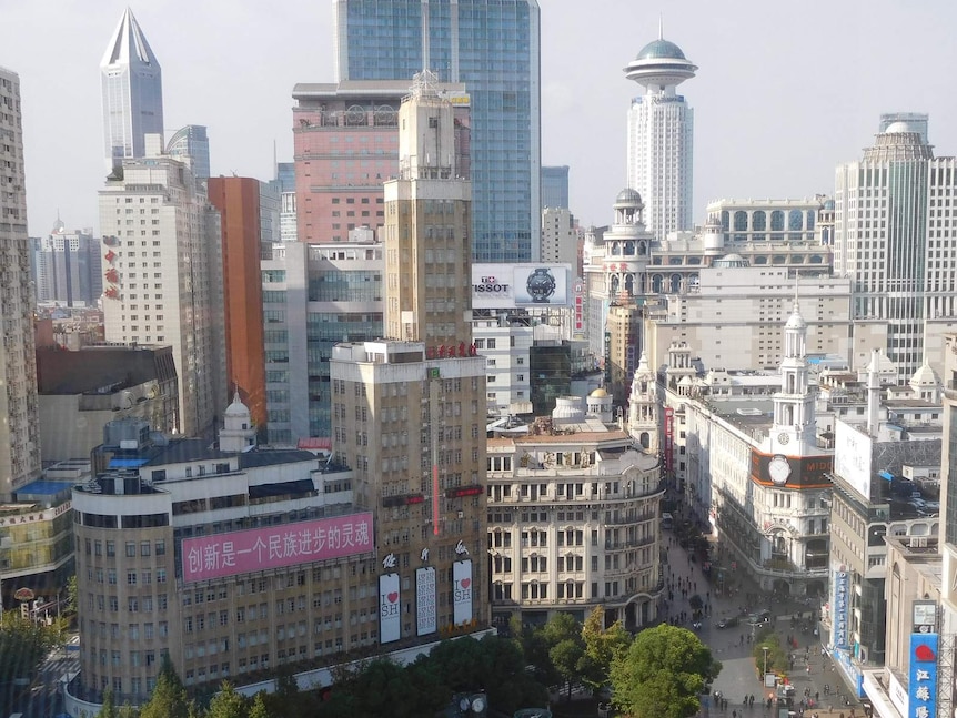 The department stores of Shanghai, looking west along Nanjing Road.