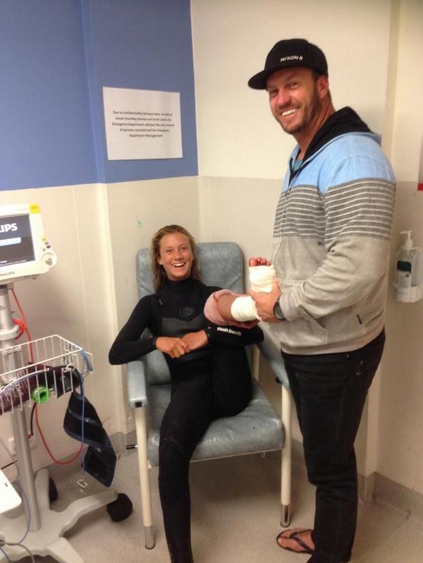 Kirra-Belle Olsson with her father Jamie in hospital after the shark attack in October 2014.