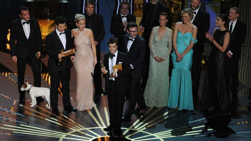 The Artist producer Thomas Langmann accepts Best Picture Oscar