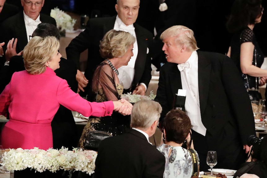 Hillary Clinton and Donald Trump shake hands