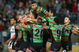 Rabbitohs showe their joy after scoring a try