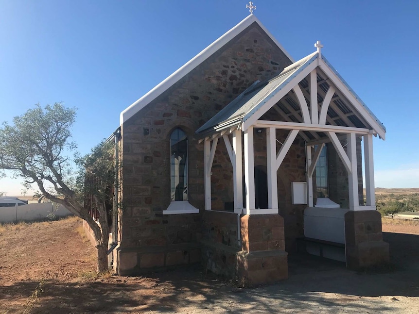 The front of the restored stone church