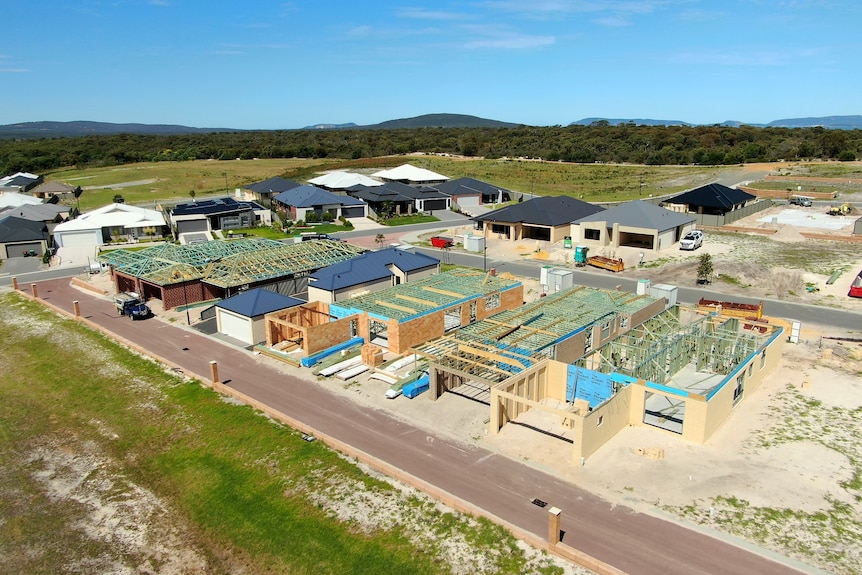 Aerial picture of multiple houses under construction in new subdivision