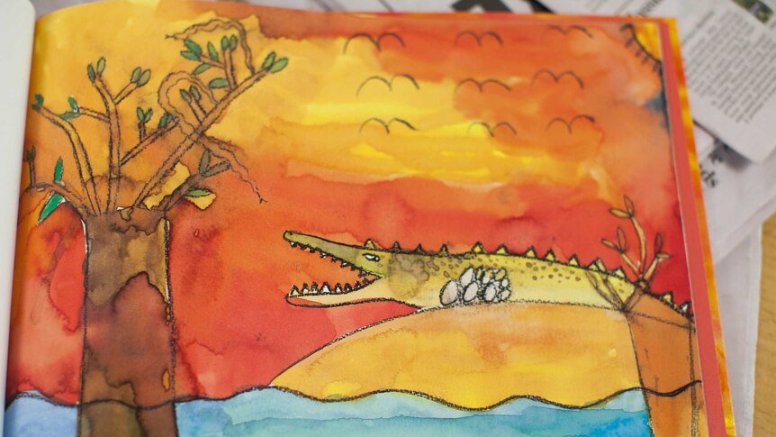 A watercolour drawing of a crocodile beside a tree