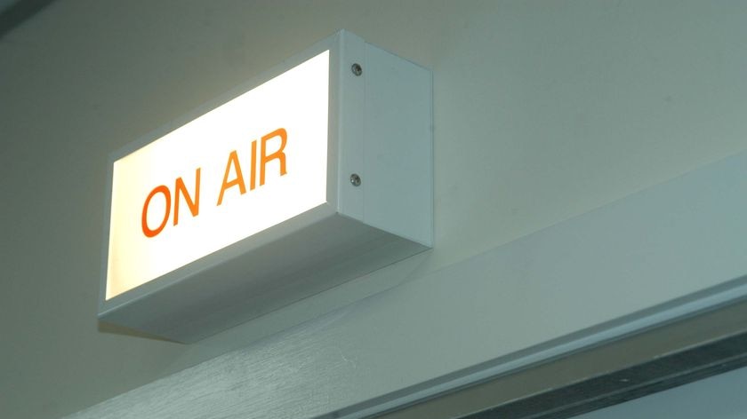 An on-air sign above a studio