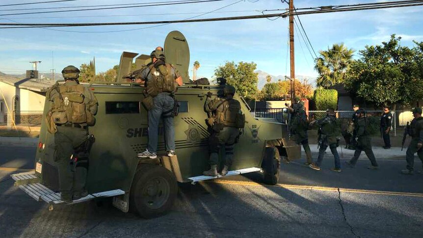 Police SWAT team manhunt for San Bernardino shooters