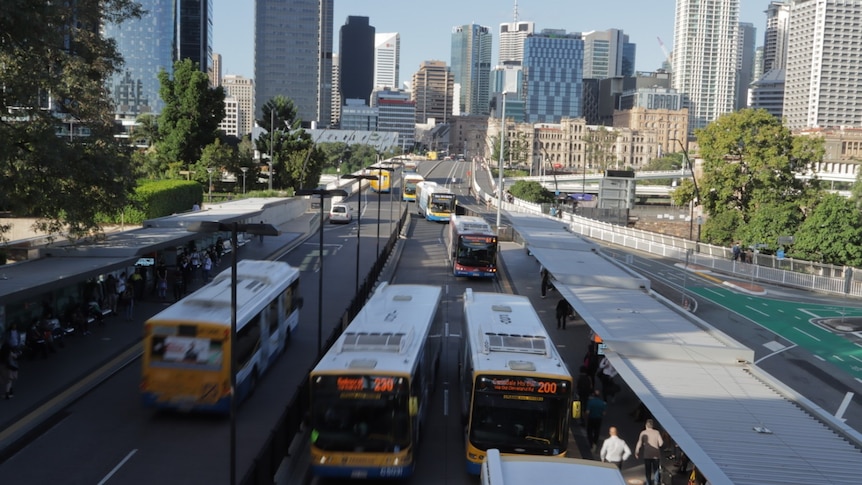 Buses seen from a bridge
