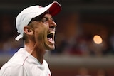John Millman screams out during his fourth-round match at the US Open against Roger Federer.