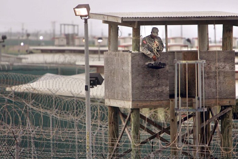 A US soldier guards the Guantanamo Bay prison camp in Cuba.