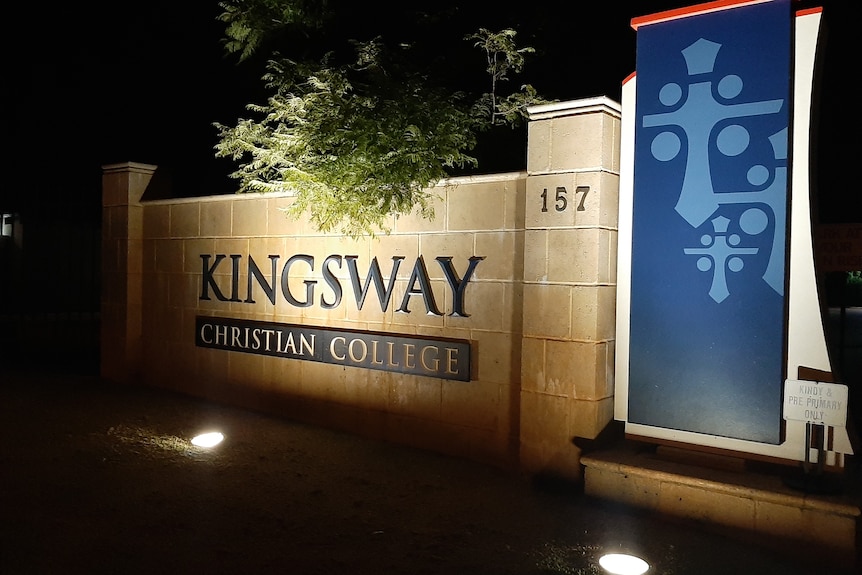 A shot of the gates of Kingsway Christian College at night.