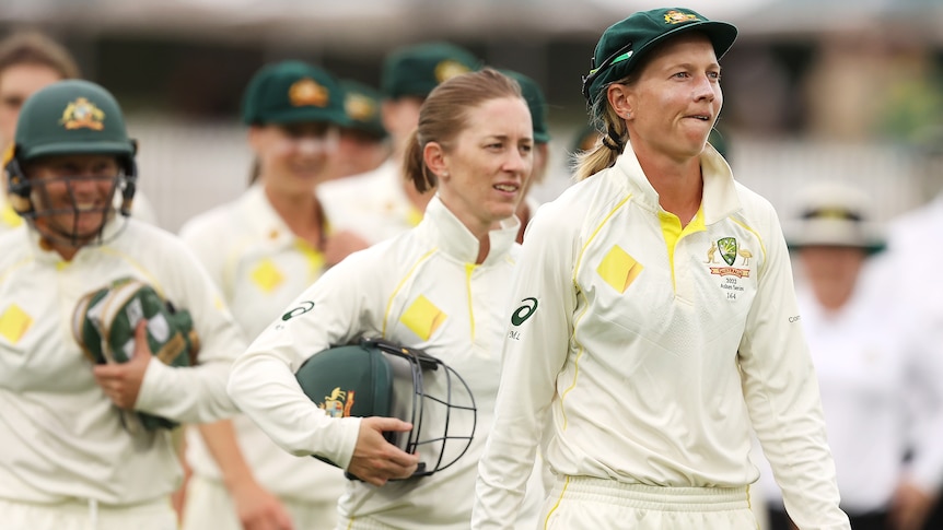 Australian women's cricket captain Meg Lanning leads her team off the field 