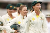 Australian women's cricket captain Meg Lanning leads her team off the field 