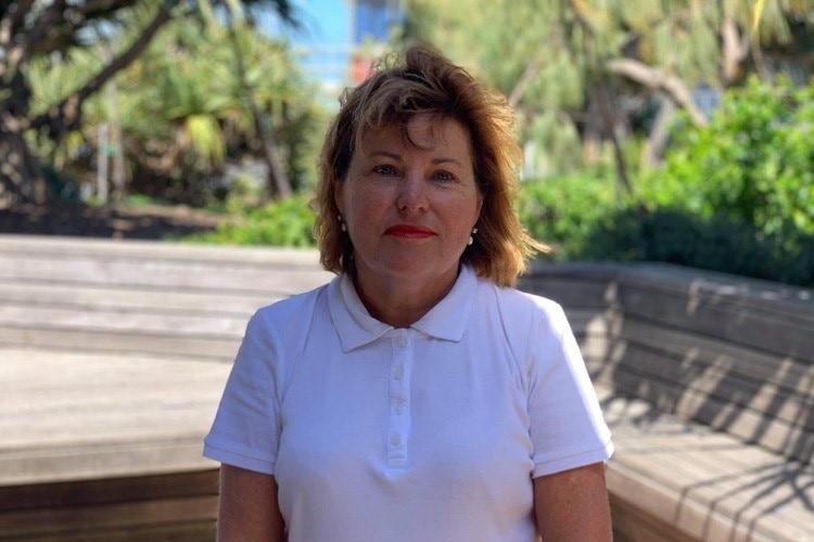 Retired Member for Bundamba Jo-Ann Miller in a white polo shirt poses for camera.