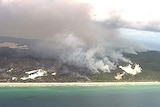 Aerial still of bushfire burning on Fraser Island off south-east Queensland.