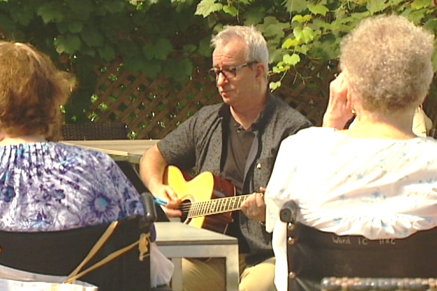 John Swan singing